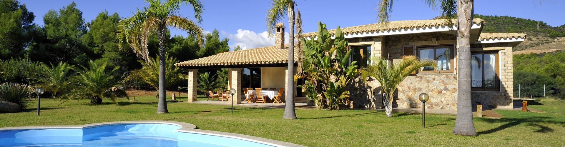 Villa Il Palmeto | Piscina e giardino con palme Piscina e giardino
