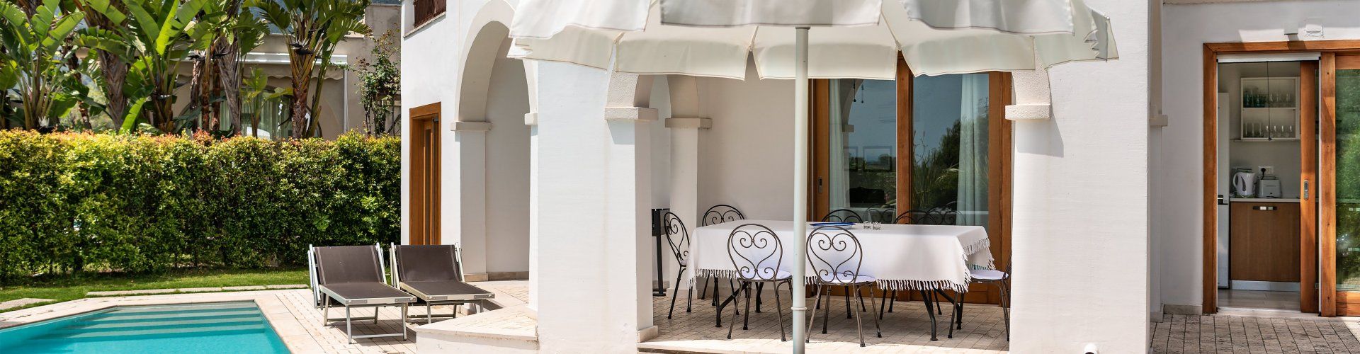 Villa del Campo | Vista esterna con piscina, veranda e tavolo Vista esterna con piscina, veranda e tavolo