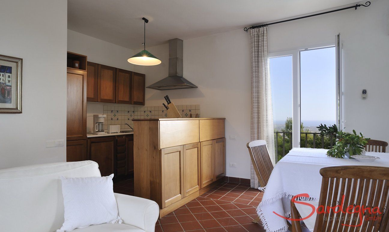 Villa Aquila Alta | Cucina integrata nel soggiorno Sardegna