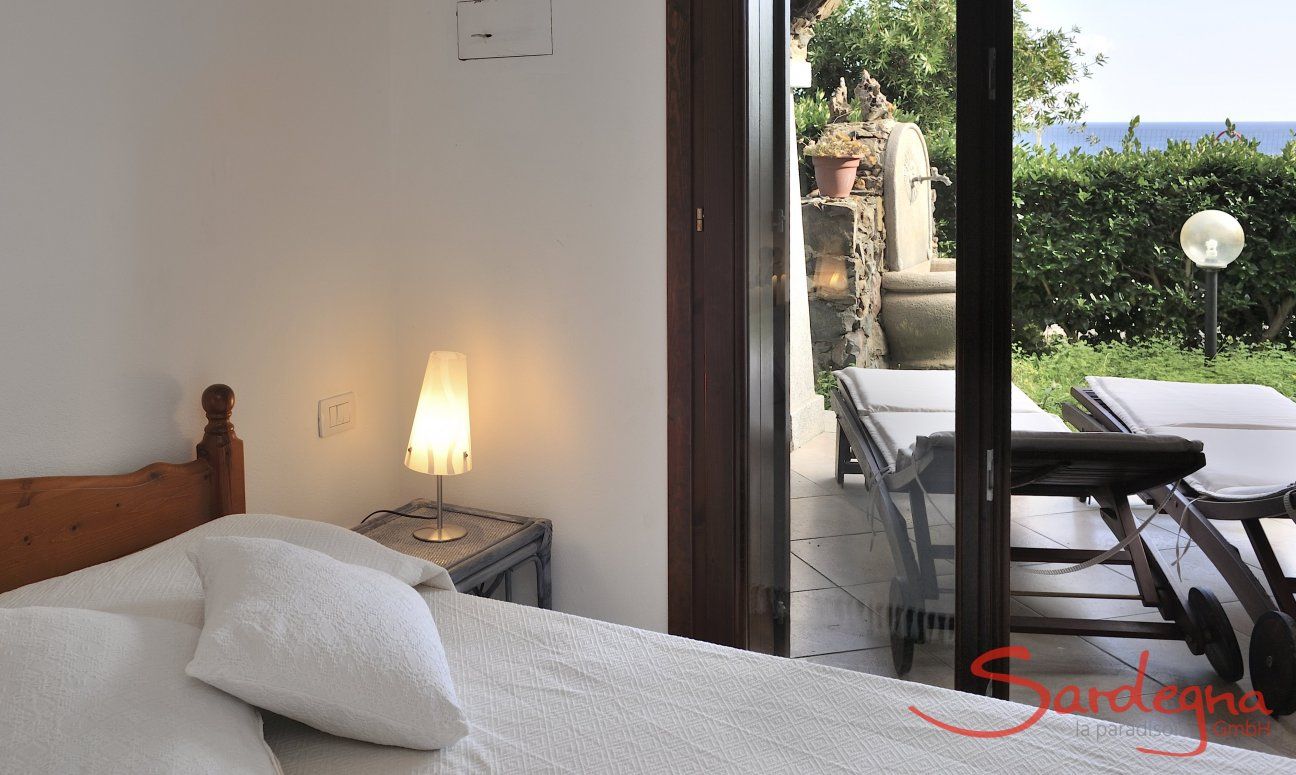 Apartment Castededdu 9 | Camera 1 con accesso alla veranda Camera da letto