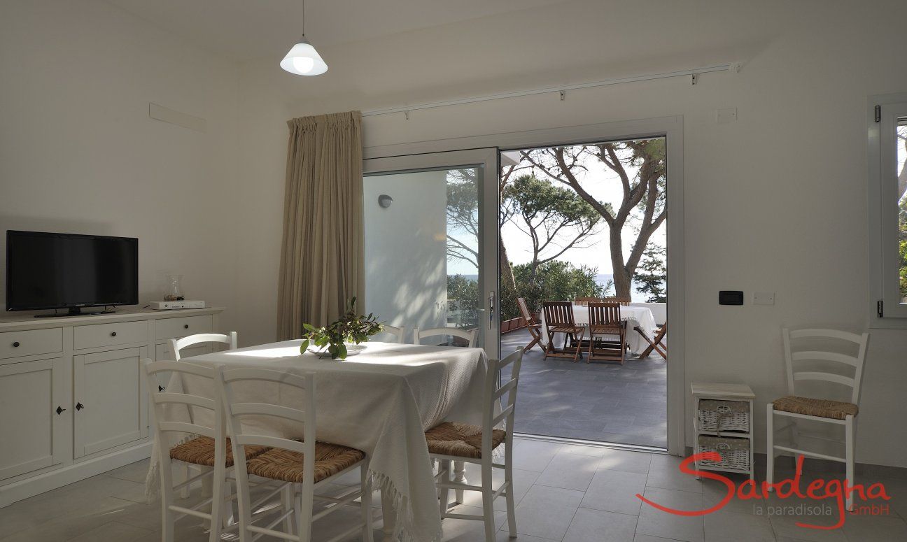 Apartment Cala Liberotto I | Tavolo per mangiare sia dentro che fuori Pranzo