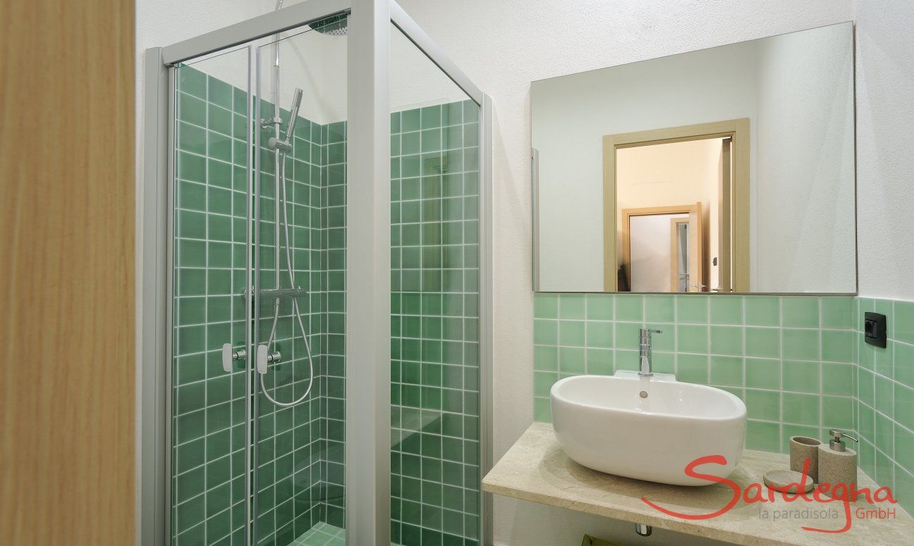 Apartment Cala Liberotto I | Bagno della camera 1 con doccia Bagno