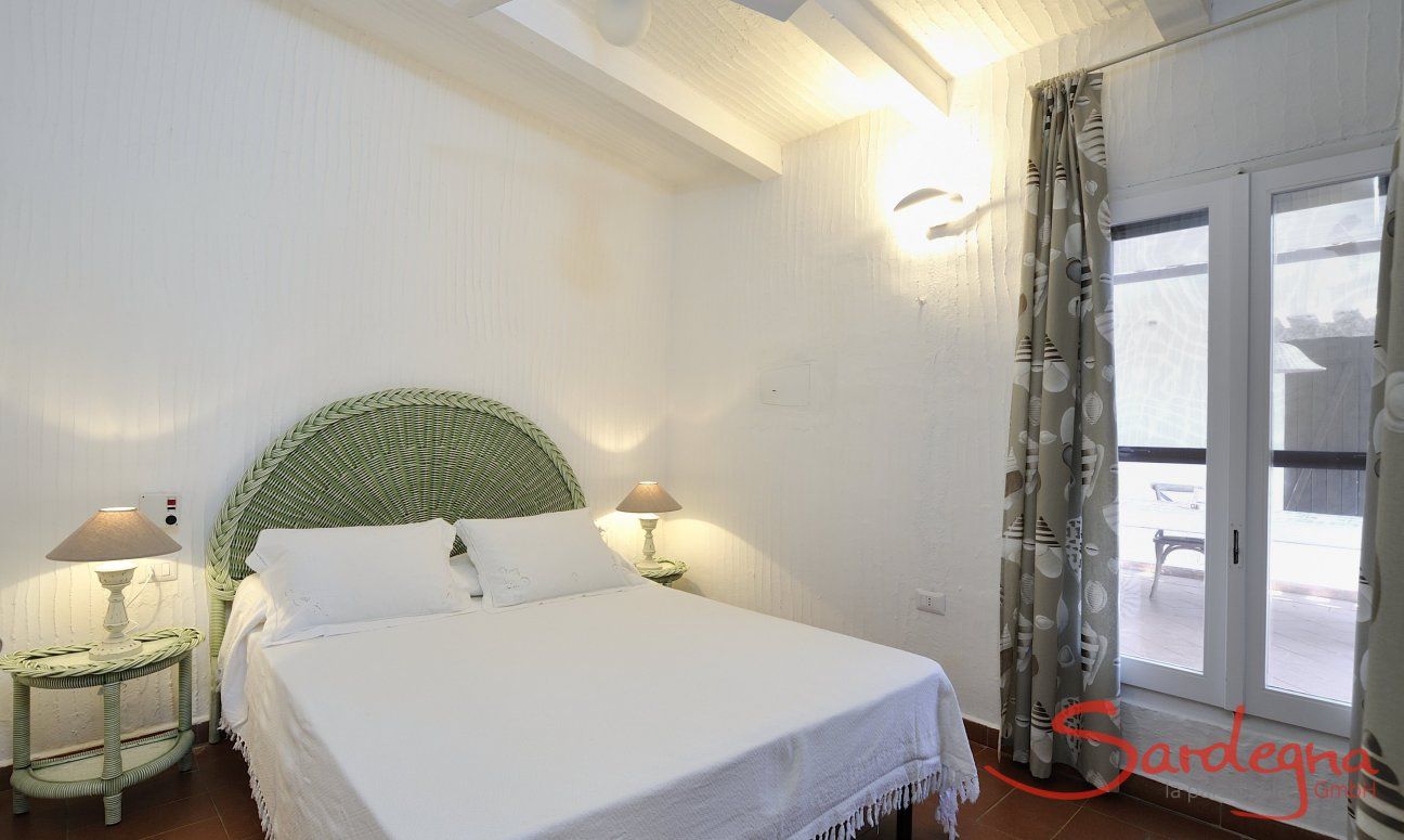 Casa 2 | Su ogni lato del patio si trova una camera con letto matrimoniale Camera da letto