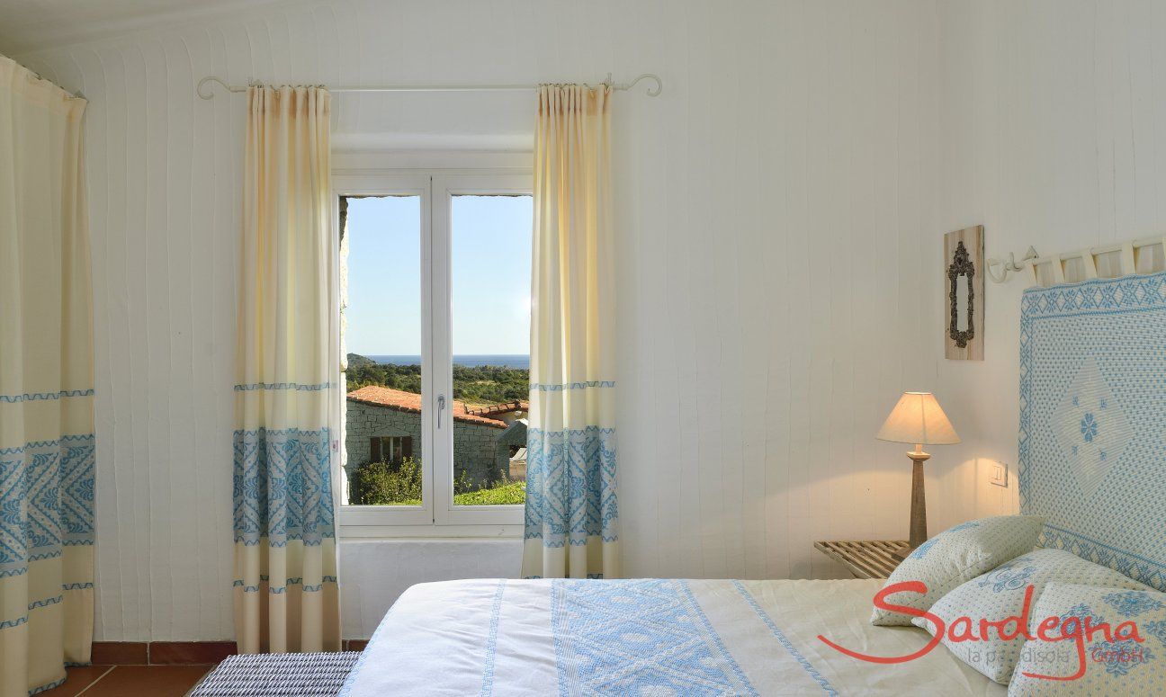 Li Conchi 10 | Camera Principale Vista Camera matrimoniale con vista giardino Li Conchi 10, Cala Sinzias