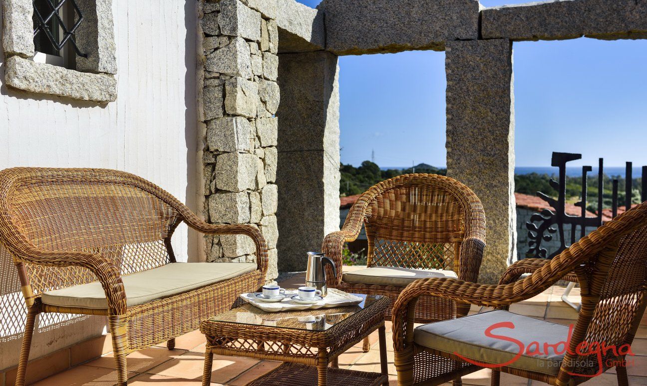 Li Conchi 28 | Divanetto esterno sul patio con vista mare Relax