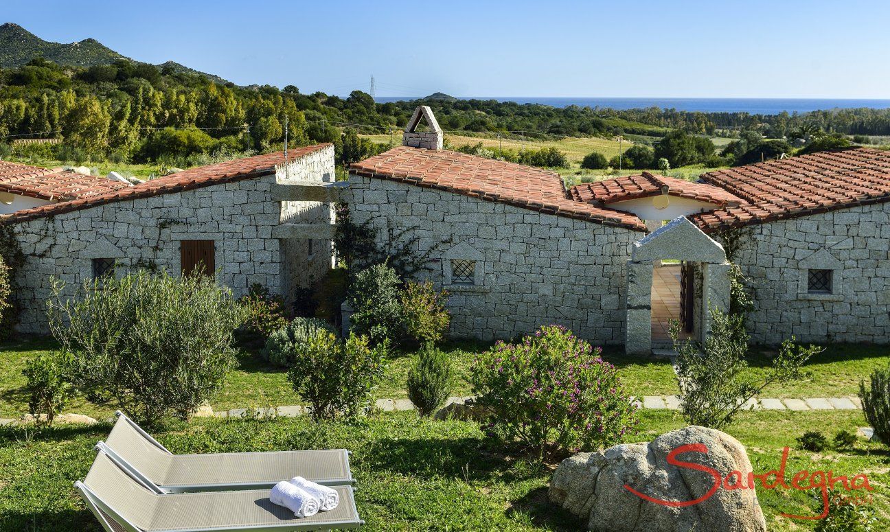 Li Conchi 28 | Giardino con lettini da sole per rilassarsi Giardino
