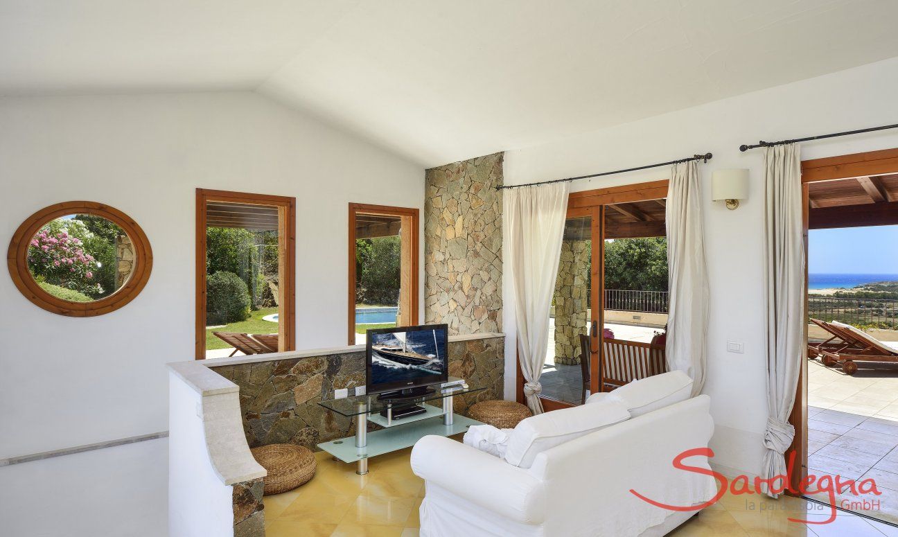 Villa Torretta Chia | Salotto con vista panoramica fino al mare Salotto con vista
