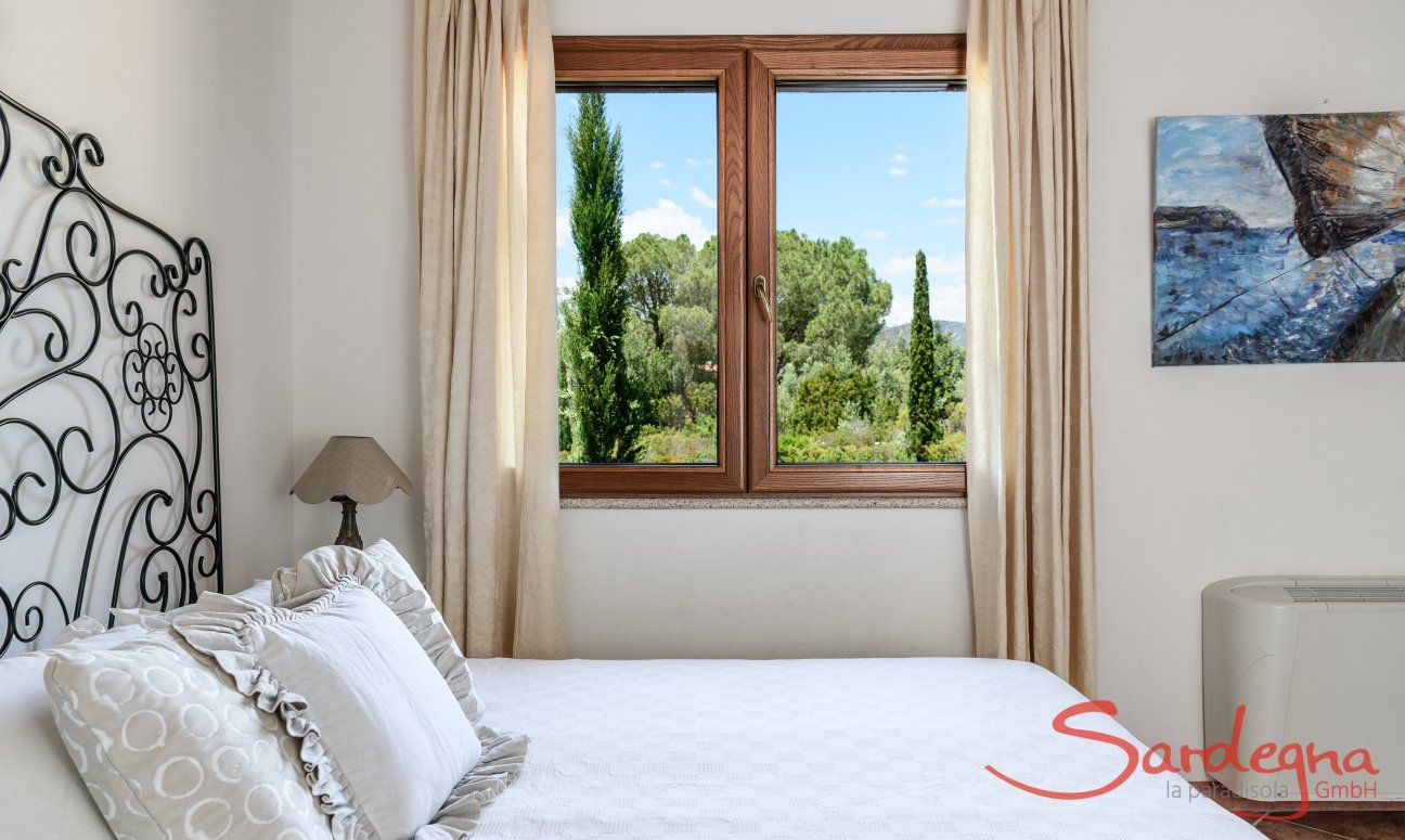 Villa Isabelle | Camera 4 con letto matrimoniale e vista giardino Villa Isabelle, Torresalinas
