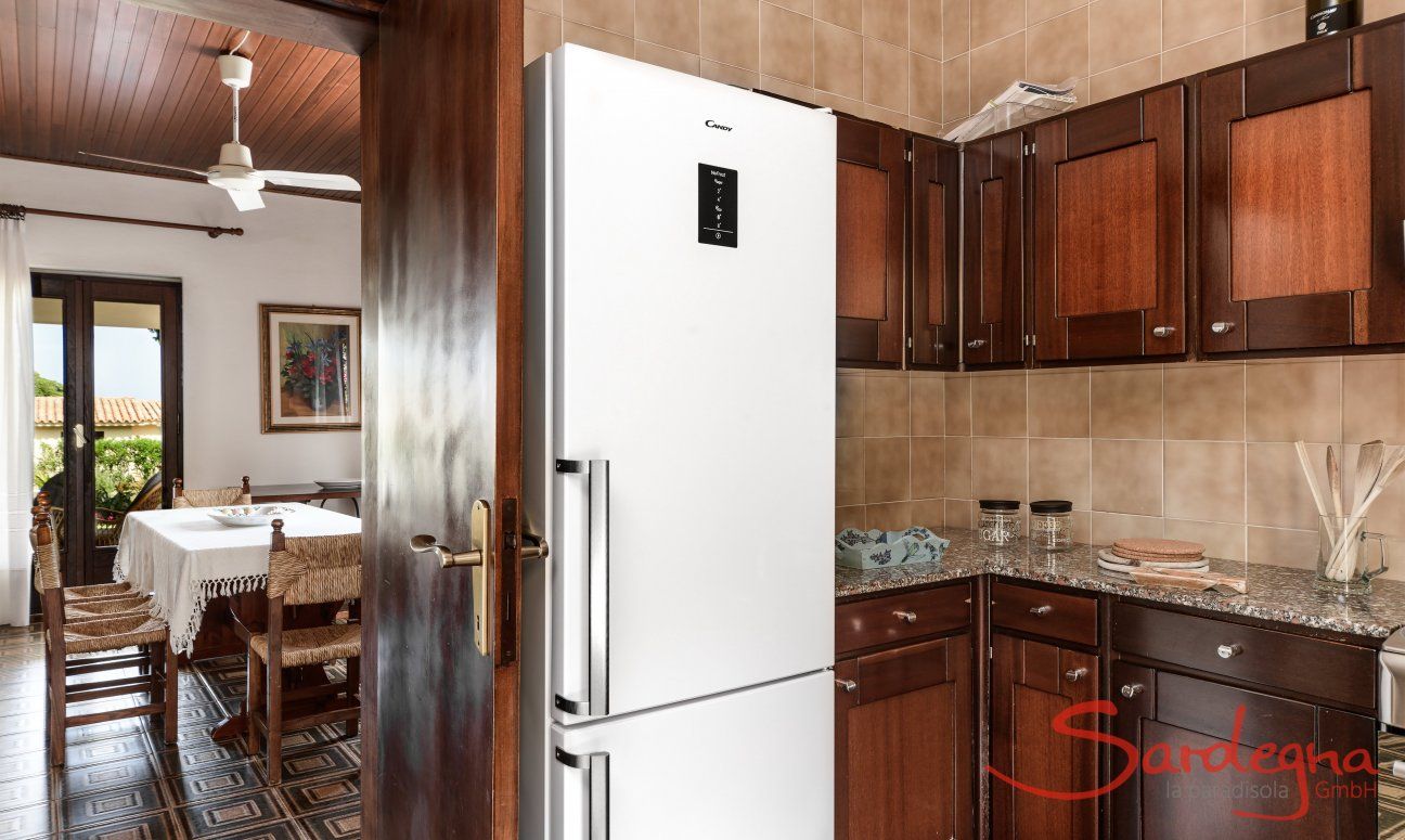 Villa Palme | Cucina con accesso diretto alla zona pranzo Villa Palme, Costa Rei
