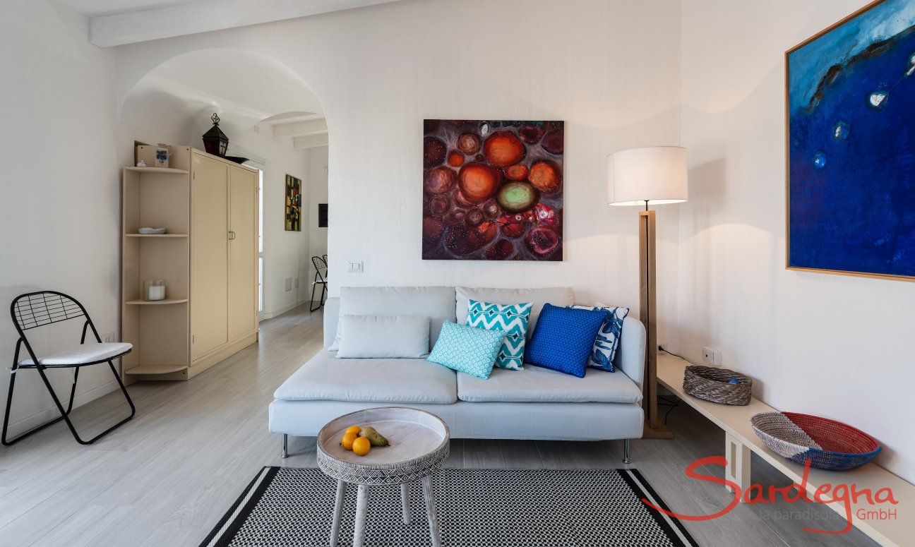 Casa 1 | Un corridoio aperto conduce dal soggiorno alla cucina Soggiorno Casa 1 Sant'Elmo