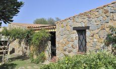 Casa Meloni 1 | Entrata attraverso il giardino mediterraneo Casa Meloni 1