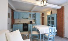 Villetta Pino | Salotto con angolo cottura Salone