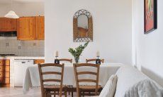 Apartment Castededdu 6 | Salotto con cucinotto, tavolo e angolo divano Salotto