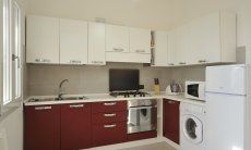 Apartment Cala Liberotto I | Cucina moderna ben arredata Cucina