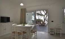 Apartment Cala Liberotto I | Tavolo per mangiare sia dentro che fuori Pranzo