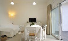 Apartment Cala Liberotto I | Soggiorno luminosa con accesso diretto sulla terazza Living