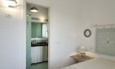 Li Conchi 25 | Camera da letto 1 con bagno privato Camera da letto 1 con vista bagno