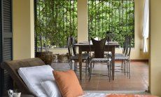 Villa Ulivi 12 | Veranda coperta con zona relax e zona pranzo Sardegna