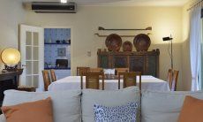 Villa Ulivi 12 | Soggiorno e zona pranzo con accesso alla cucina Living e pranzo