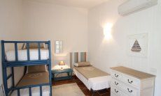 Li Conchi 33 | Camera 2 con letto a castello e letto singolo Camera da letto