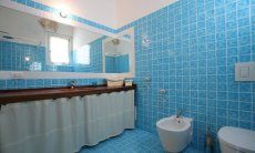 Li Conchi 21 | Bagno privato della camera 1 con doccia Bagno 1