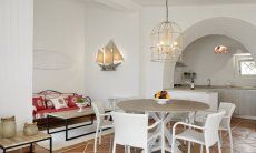Li Conchi 33 | Tavolo da pranzo, divanetto e cucina Sala da pranzo