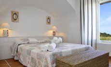 Li Conchi 39 | Camera 1 con letto matrimoniale e vista giardino Camera da letto 1