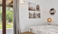 Villa Campidano 7 | Camera 4 con letto matrimoniale e accesso al giardino Camera