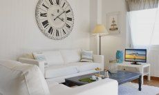 Li Conchi 1 | Angolo divano con TV e finestra panoramica Li Conchi 1