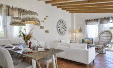 Li Conchi 1 | Sala con zona pranzo e angolo divano Li Conchi 1