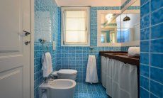 Li Conchi 26 | Bagno privato della camera 1 Ensuite Bagno 1