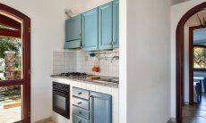 Villa Le Ginestre 1 | Cucina al pianterreno con cucina a gas, forno e frigo grande Cucina al pianterreno con cucina a gas, forno e frigo grande