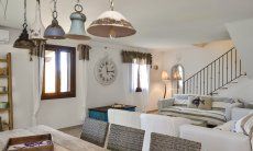 Apartment Orchidea-A | Grande salotto con tavolo Vista sul salotto dal tavolo