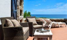 Terrazza con divano, lettini da sole e vista mare, Casa 24, Sant Elmo