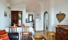 Apartment Castededdu 1 | Sala con zona relax, zona pranzo e angolo cottura Sala