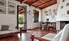 Villa Alessia | Salotto con zona pranzo e accesso al giarndino Salotto