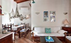 Villa Vela | Salotto con zona pranzo e zona relax Salotto