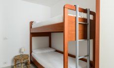 Villa Le Ginestre 1 | Camera 5 nel semi interrato con letto a castello 11 2018 New Picture