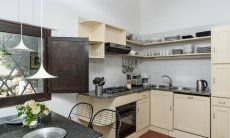 Casa 1 | Cucina abitabile con fornelli a gas, forno e lavastoviglie Casa 1 Sant Elmo Sardegna del Sud