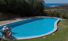 Villa Torretta Chia | Pisicna infinity con vista mare Vista aerea Torretta Chia