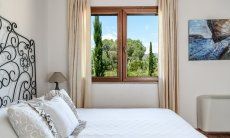 Villa Isabelle | Camera 4 con letto matrimoniale e vista giardino Villa Isabelle, Torresalinas