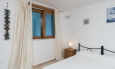 Villa del Campo | Camera 4 con letto matrimoniale nel piano interrato Villa del Campo, Is Molas, Pula