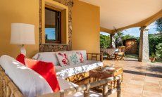 Villa Tiziana 11 | Il salotto in bambu è perfetto per rilassarsi all'aria aperta Rittratto della casa