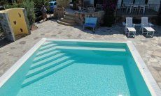 Villa Maestrale | Piscina con scala Villa Maestrale, Cala Ginepro, Nord Sardegna