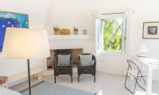 Casa 1 | Dal sofa si vede nel patio Casa 1 -Sant'Elmo