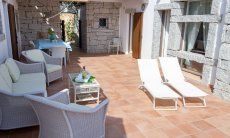 Li Conchi 11 | Terrazza con sdraio e divanetti Li Conchi 11, Cala Sinzias