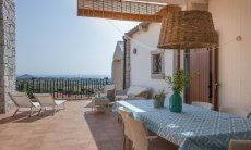 Li Conchi 11 | Terrazza con tavolo da pranzo Li Conchi 11, Cala Sinzias