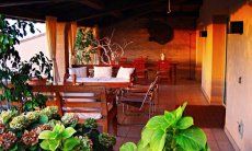 Villa Ulivi 27 | Terrazza coperta con tavolo da pranzo V. Ulivi 27